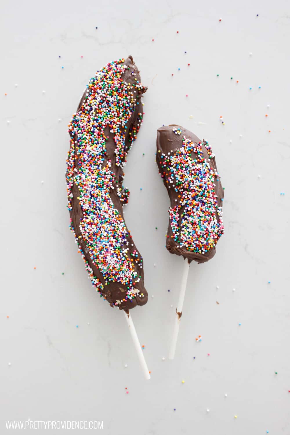 Not only are these frozen chocolate covered bananas easy to make, they are freaking delicious! Such a fun summer treat, and lots better for you than a regular ice cream bar! 