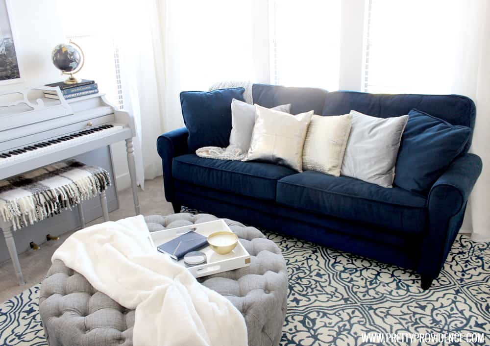 I am in love with this small front room converted to a cozy home library! I just want to sit there and read a book all day! 