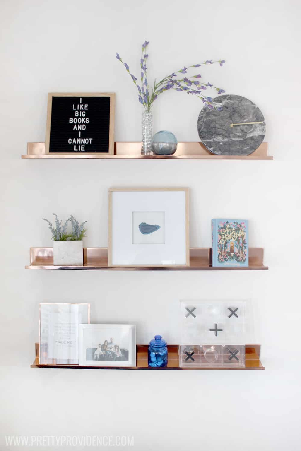 I am in love with this small front room converted to a cozy home library! I just want to sit there and read a book all day! 