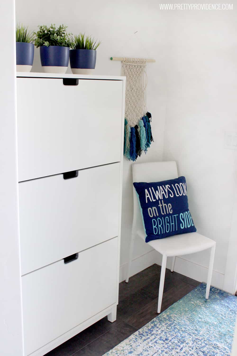 I love this tiny mudroom! Every space in a family house should be fun and functional and this one totally is! 