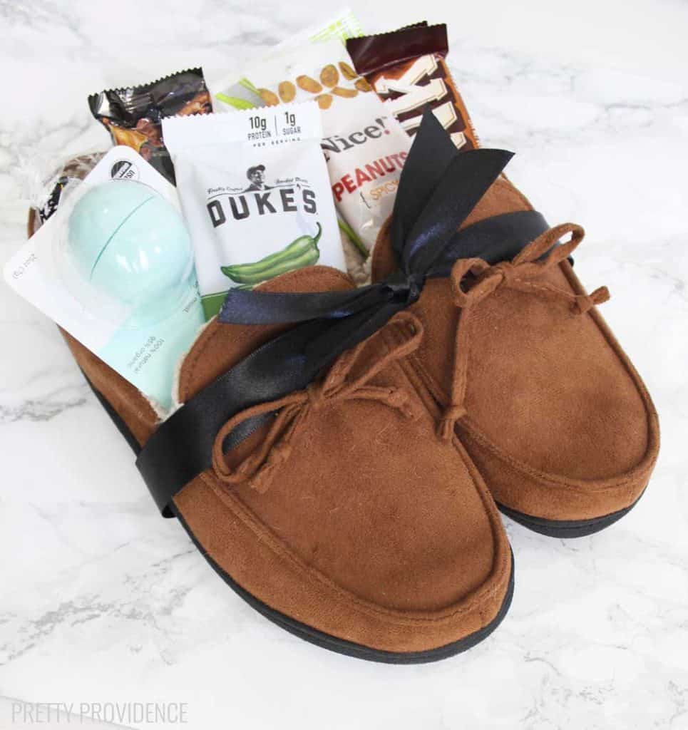 Okay I love this gift idea! Slippers make a great gift and they are even better when filled with little treats and gift cards! Perfect for Father's Day or really any occasion.