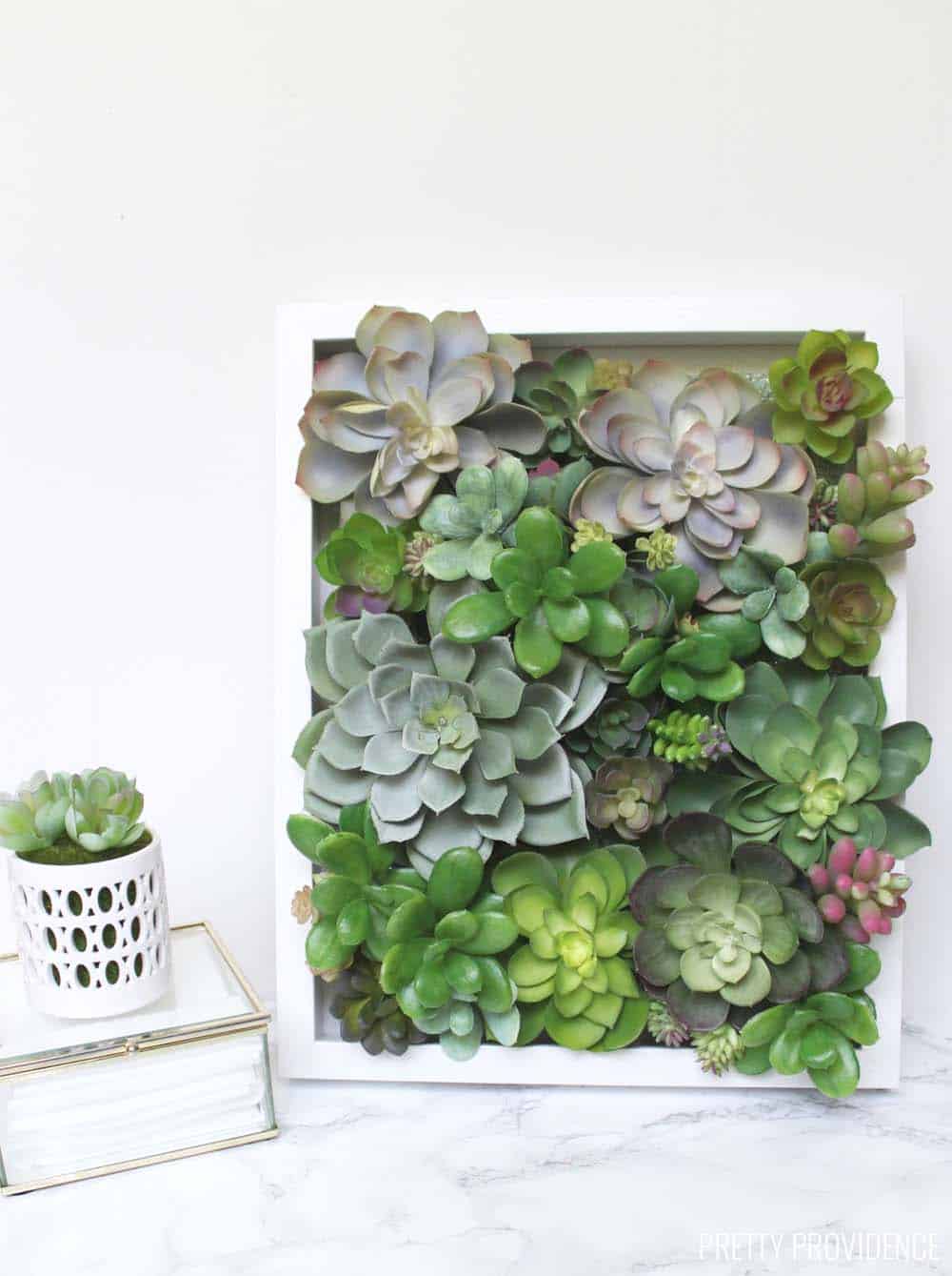 I love decorating with succulents and this easy succulent shadow box decor is perfect! So pretty!