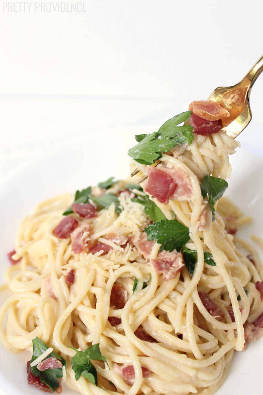 This easy spaghetti carbonara recipe is creamy and delicious - you can't go wrong with bacon and pasta!