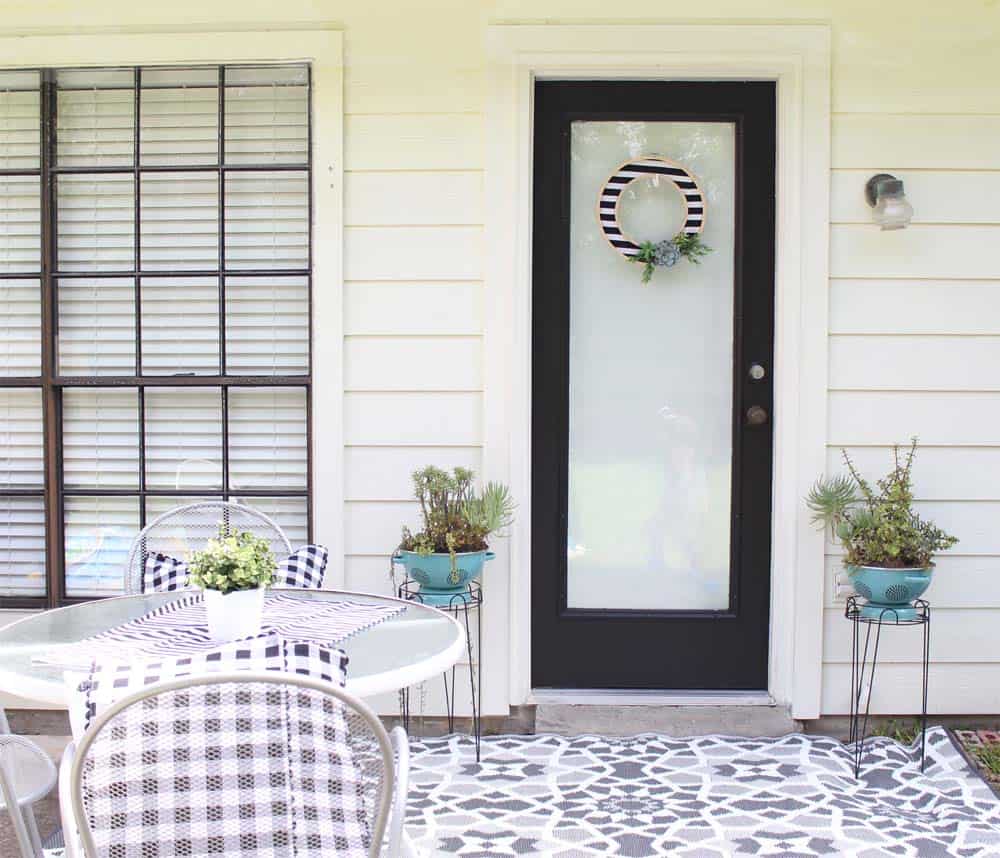 The power of PAINT! This door and patio area looks incredible and the transformation barely cost anything!