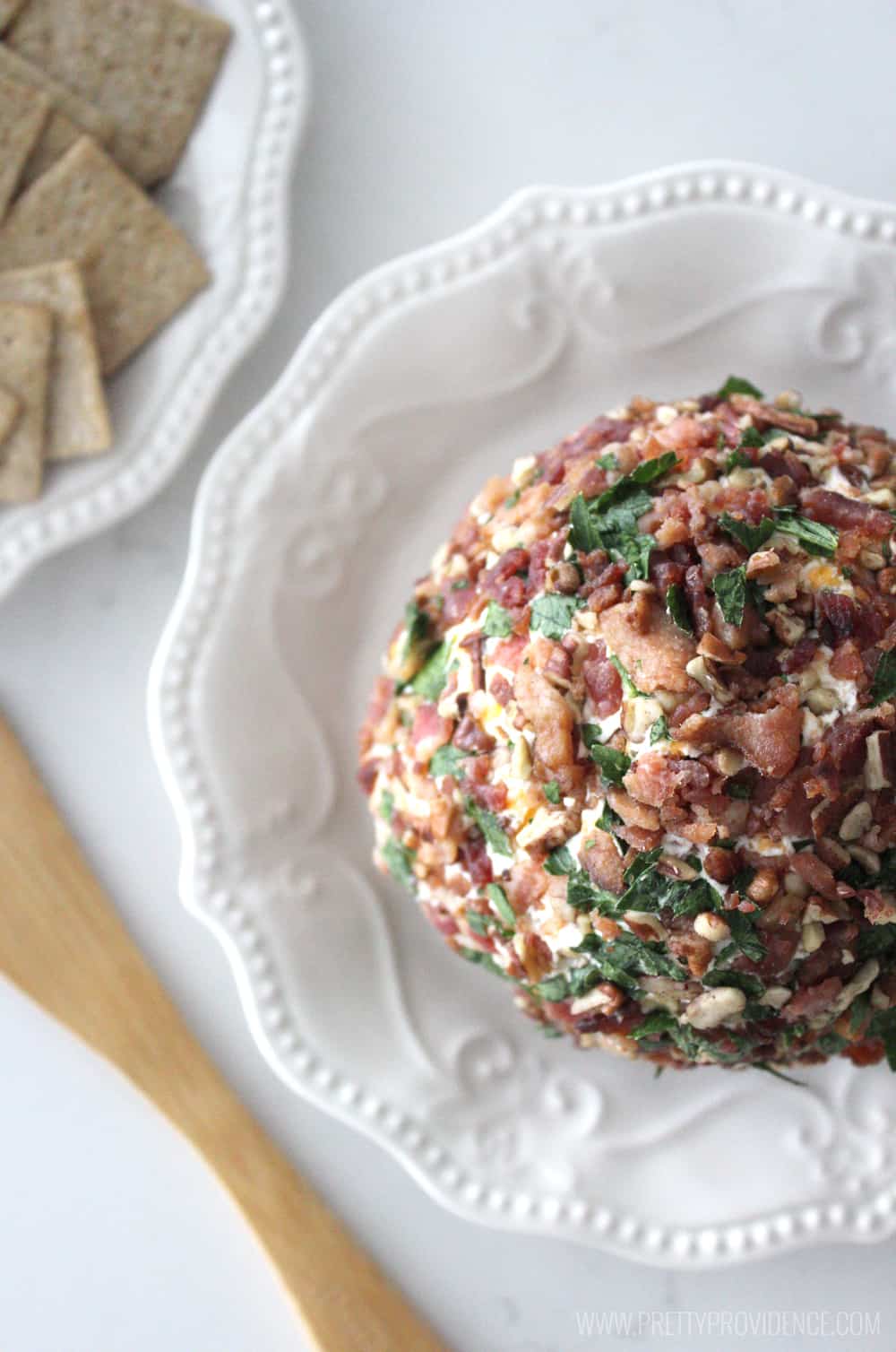 Not only is this cheese ball freaking delicious but it is also beautiful and easy to make! The perfect appetizer to bring to any get together! 