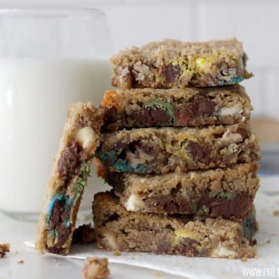 These loaded cookie bars are unbelievable amazing! Super easy to whip up and this recipe makes a ton!