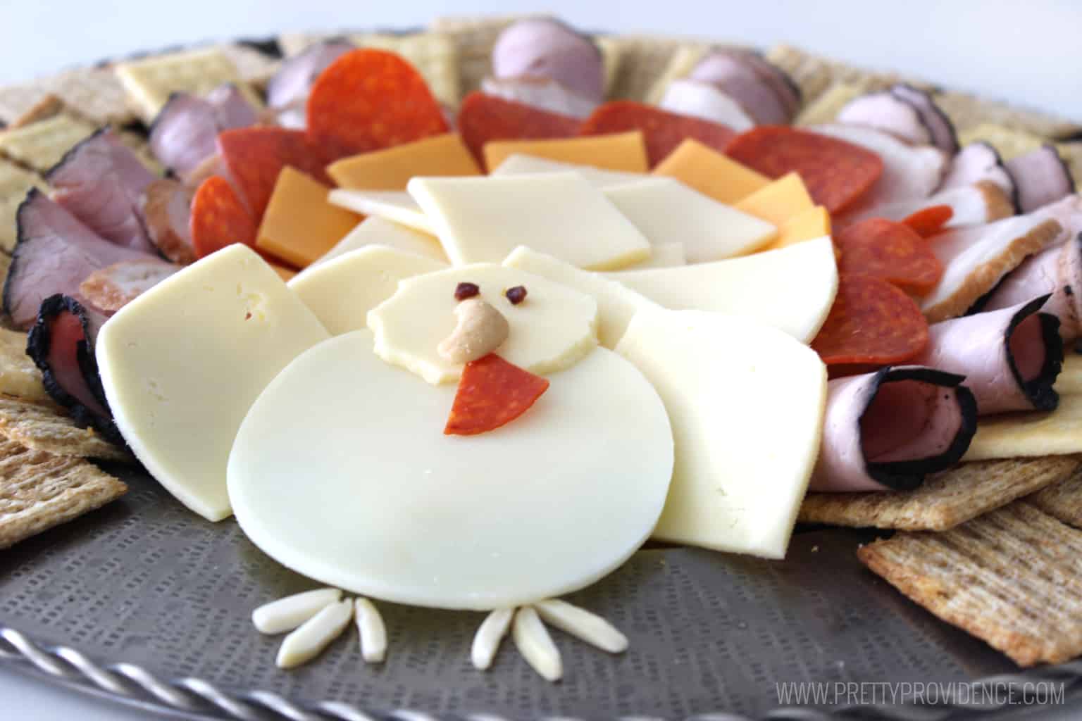 How adorable is this Thanksgiving turkey cheese platter?! It was literally SO easy to throw together, not to mention festive and delicious! 