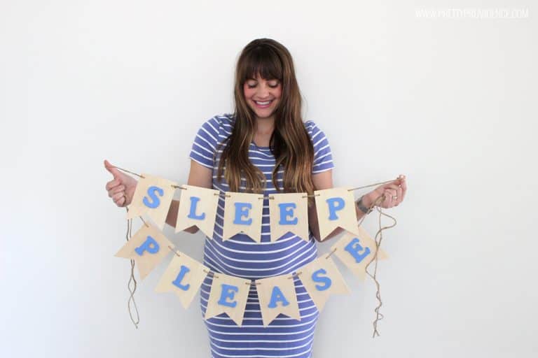 Loving this easy DIY nursery banner for under $15.00! You could totally customize it to say whatever you wanted, too!