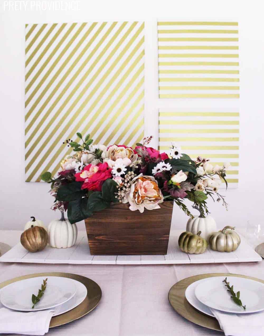 This fall table decor is perfect for thanksgiving!! You can't go wrong with floral table decorations!