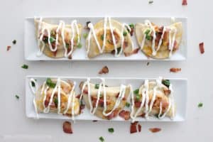 This SUPER EASY Pierogy appetizer is so delicious! Perfect for watching the game with friends or making a date night in of your favorite TV series!