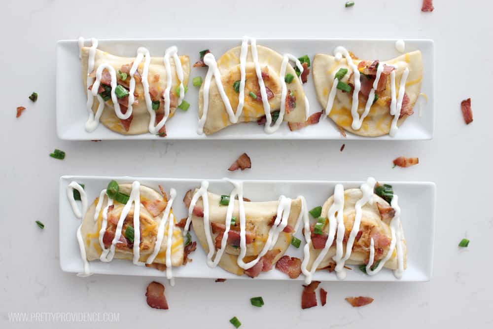 This SUPER EASY Pierogy appetizer is so delicious! Perfect for watching the game with friends or making a date night in of your favorite TV series! 