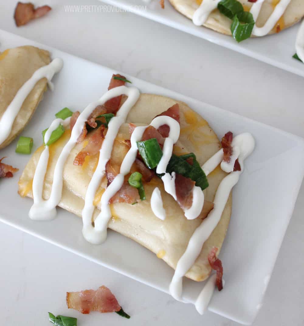 This SUPER EASY Pierogy appetizer is so delicious! Perfect for watching the game with friends or making a date night in of your favorite TV series! 