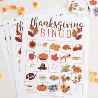 Thanksgiving bingo cards with candy corns used as markers.