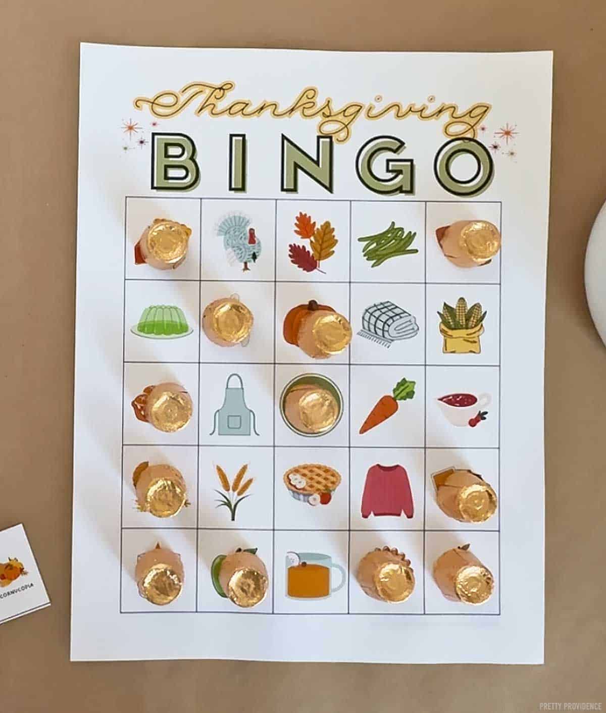 Thanksgiving bingo game using rolos (gold foil wrapped chocolates) for markers.