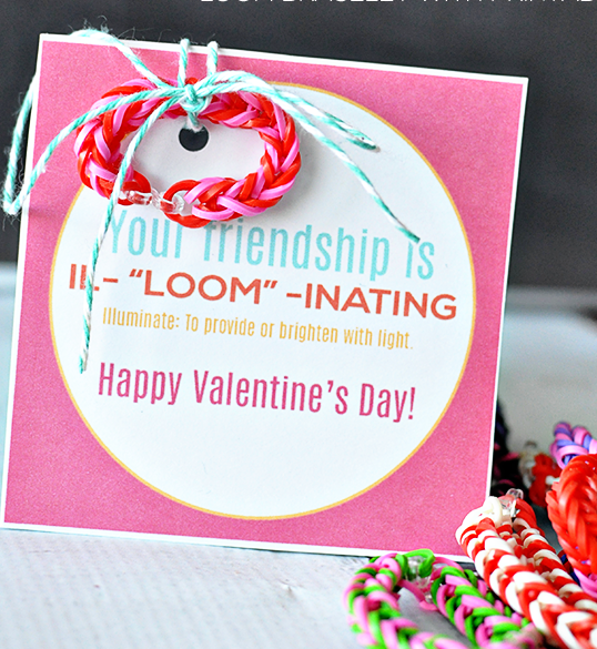Rainbow loom bracelet with Valentine that says 'Your friendship is il-loom-inating.'