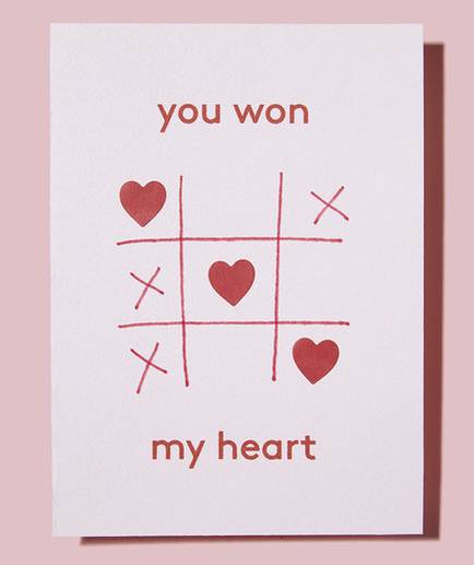 White Valentine's Day card with Tic Tac Toe game using hearts and the phrase 'you won' on it - from realsimple.com