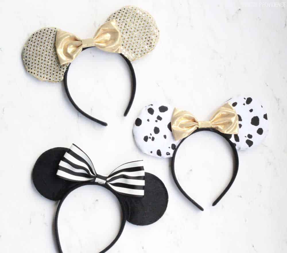 three pairs of diy no sew minnie mouse ears on a white counter