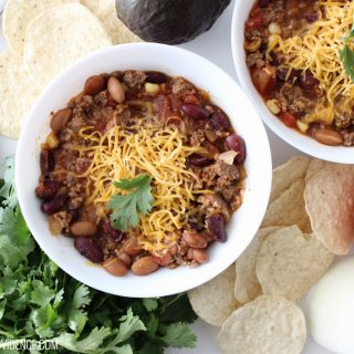 Taco soup is a staple at our house! Any meal that can be thrown together in five minutes, pleases everyone and is healthy to boot is an automatic win in my book!