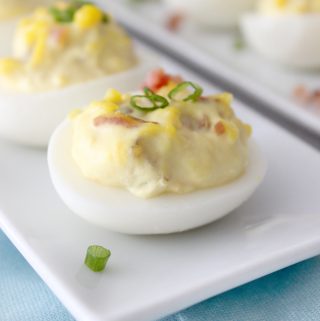 If you like deviled eggs you will LOVE these bacon and cheese deviled eggs! They disappear in a blink everywhere I bring them!