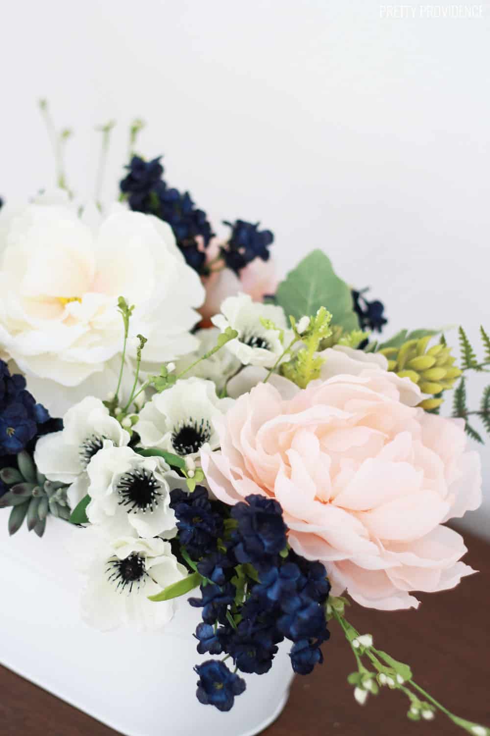 Navy, pink peonies and succulents arrangement for a wedding or spring table! 