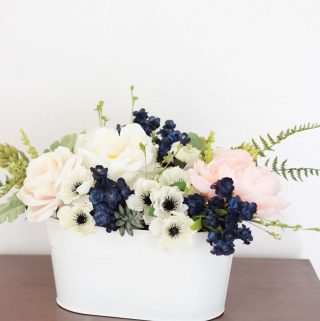 Navy, pink peonies and succulents arrangement for a wedding or spring table!