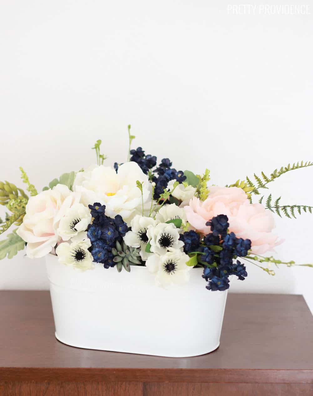 Navy, pink peonies and succulents arrangement for a wedding or spring table!