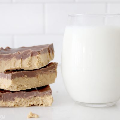 These Reese's peanut butter bars taste just like the Reese's Eggs, only bigger and better! Your whole family will love this easy no bake treat!