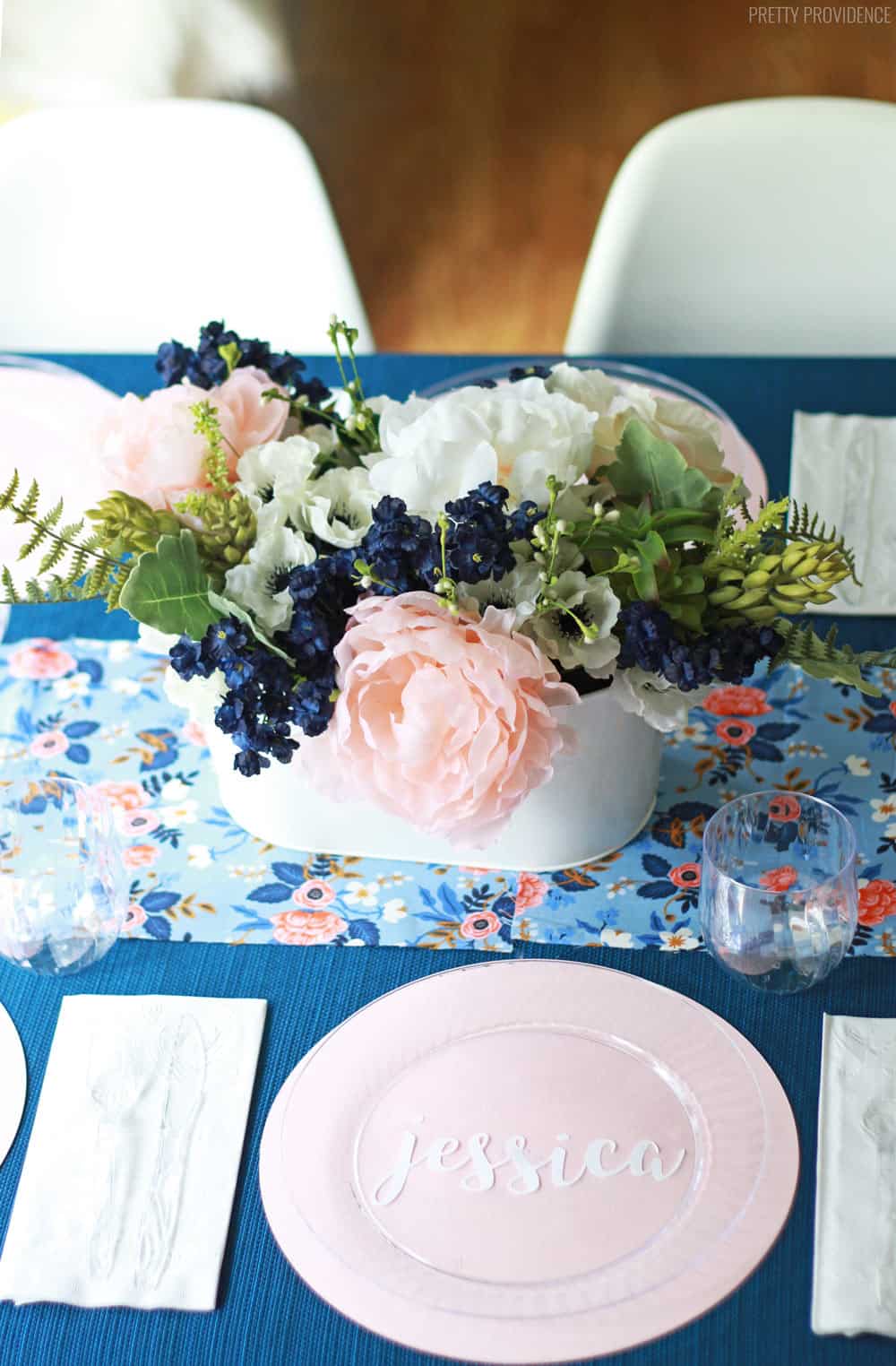 Super cute table settings with personalized name placemats under clear plates!!