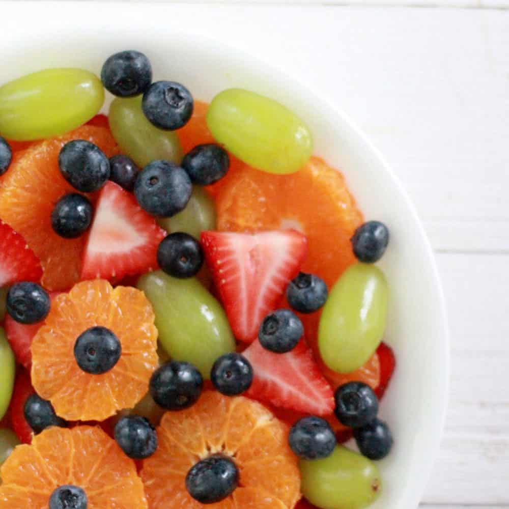 Easy fruit salad recipe with sweet vanilla pudding mix dressing.