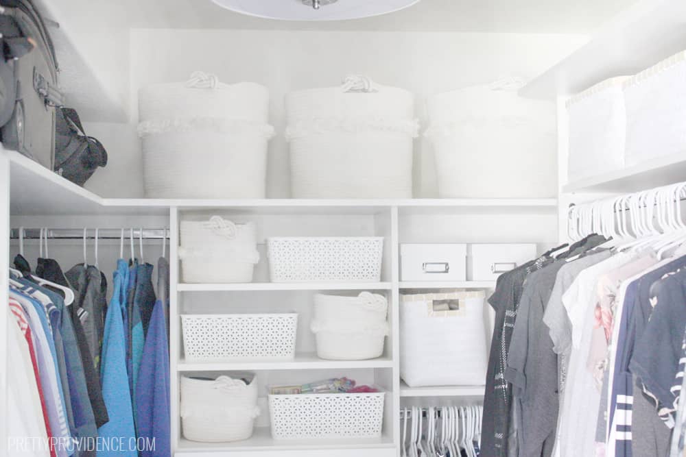 Master closet storage baskets and bins. Master closet shelving. Master closet built in hamper. 