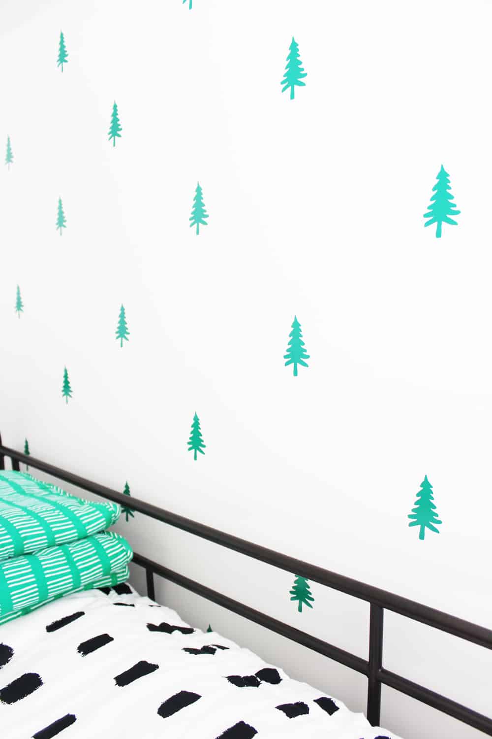 How cute is this DIY tree wall? Guess what? It took less than two hours and less than $20 to make! Oh, and it's removable! 