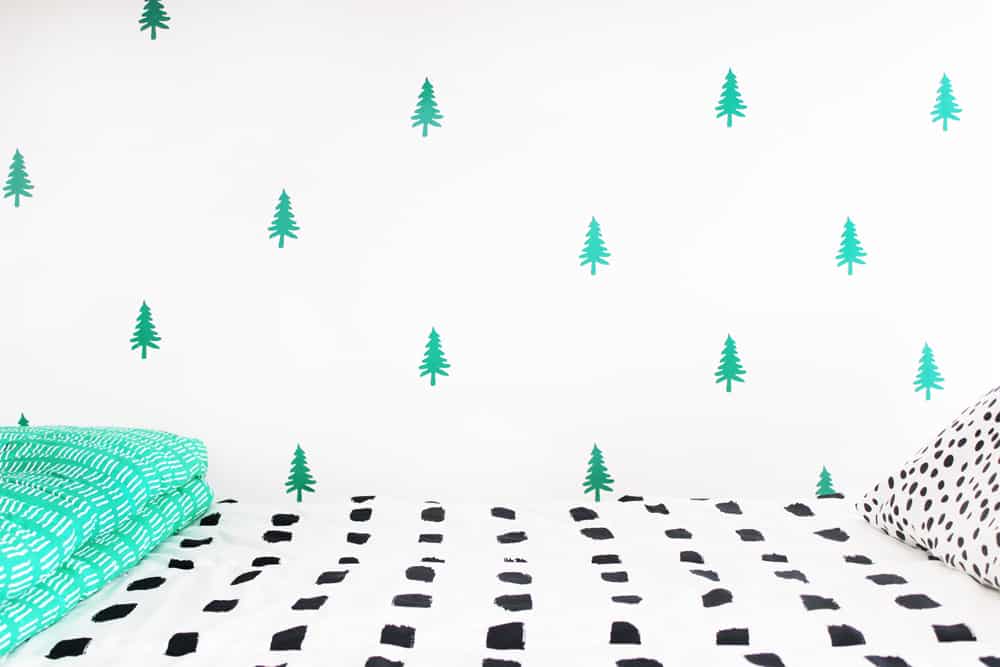 How cute is this DIY tree wall? Guess what? It took less than two hours and less than $20 to make! Oh, and it's removable!