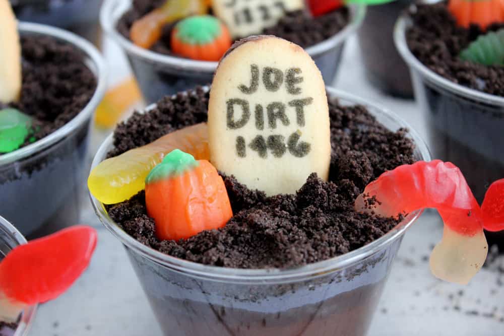 "Joe Dirt's" tombstone cookie sticking out of an oreo dirt cup