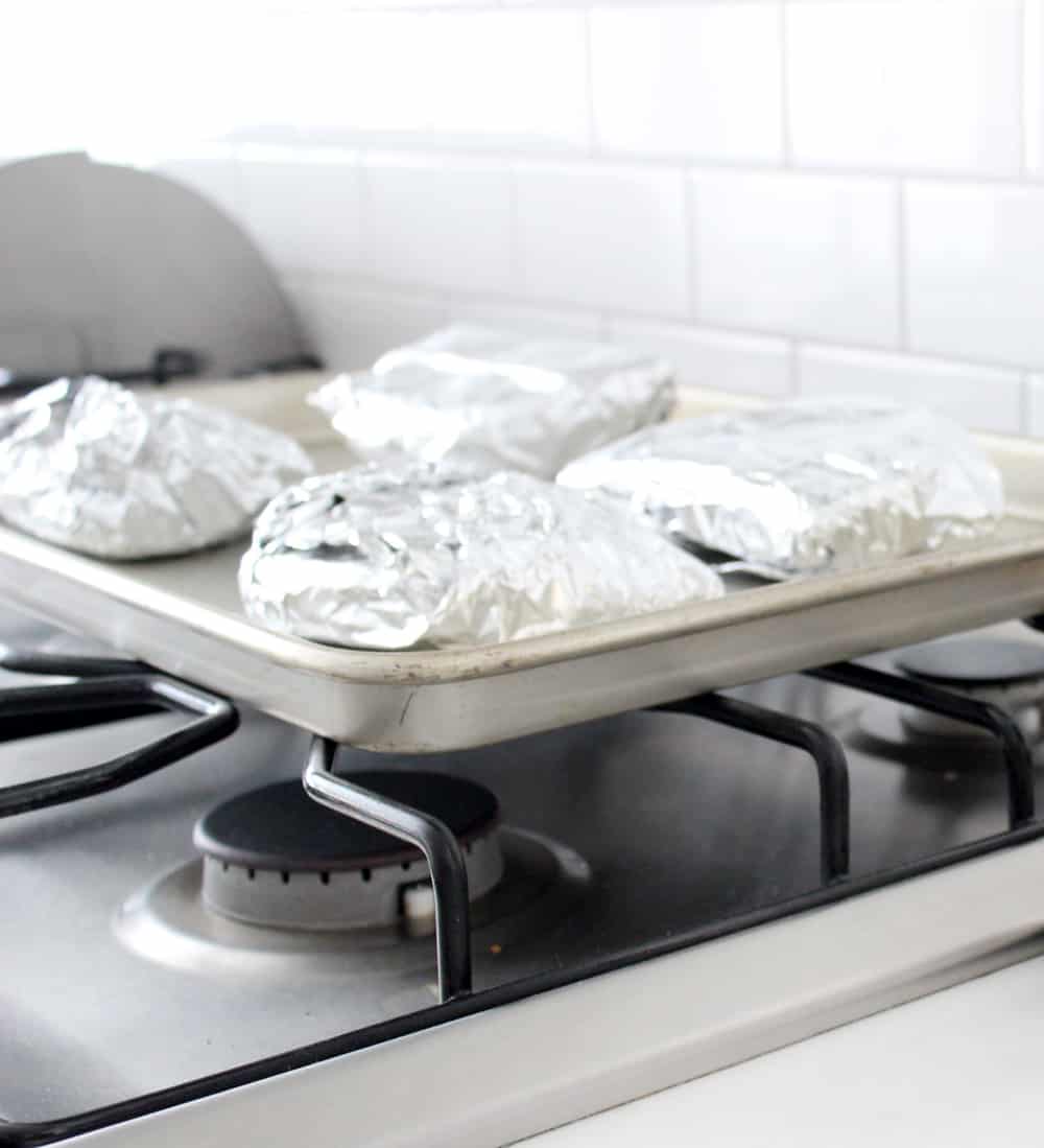 Michael Angelo's calzones wrapped in foil, about to go in the oven. 