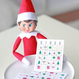 elf on the shelf with mini printable bingo game.
