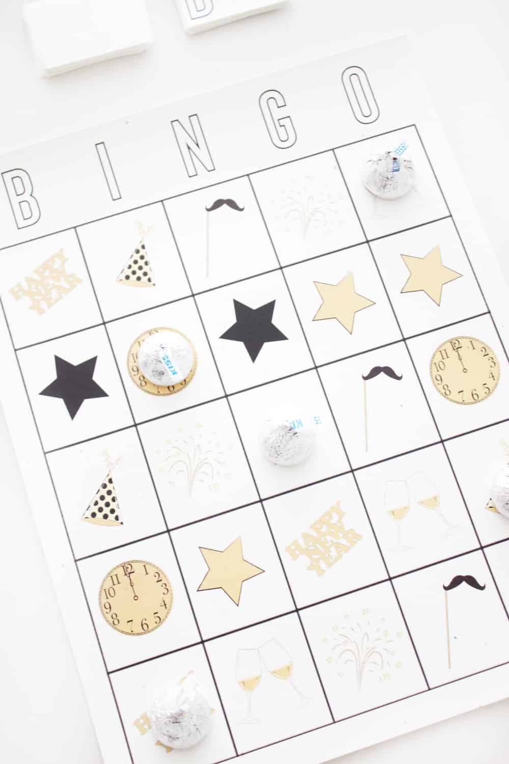 Free printable New Years Eve Bingo Card with candy markers on it. 