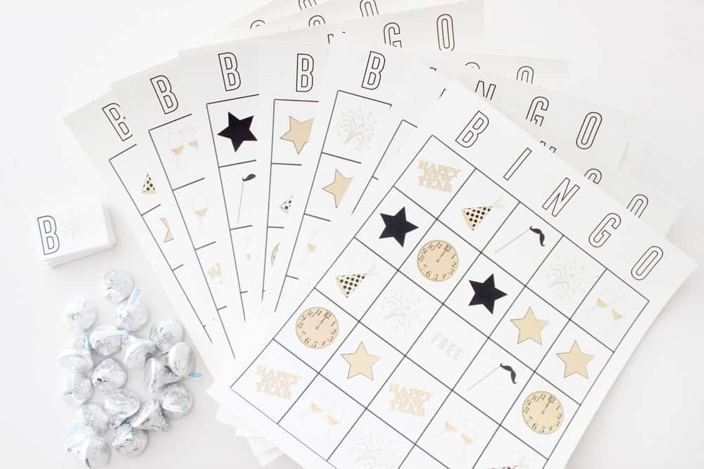 New Years Eve Bingo cards spread out in a fan shape. 