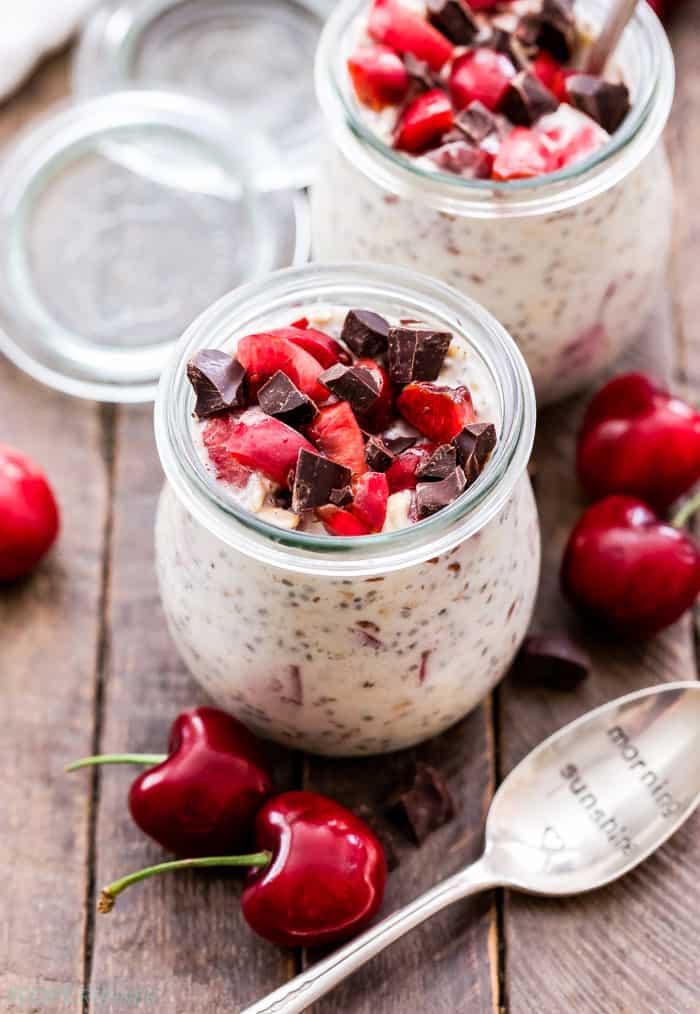 cherry chocolate overnight oats on a wooden table top