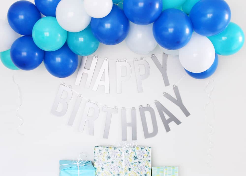 If you want a happy birthday banner that you can use over and over again you will love this happy birthday banner DIY made using the Cricut knife blade and chipboard! I can't wait to use this for all my kids birthdays for years to come. 