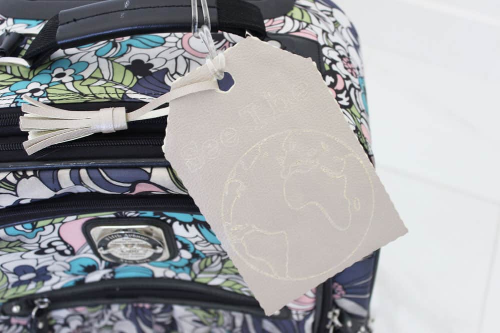 diy luggage tag on a cute floral carryon bag