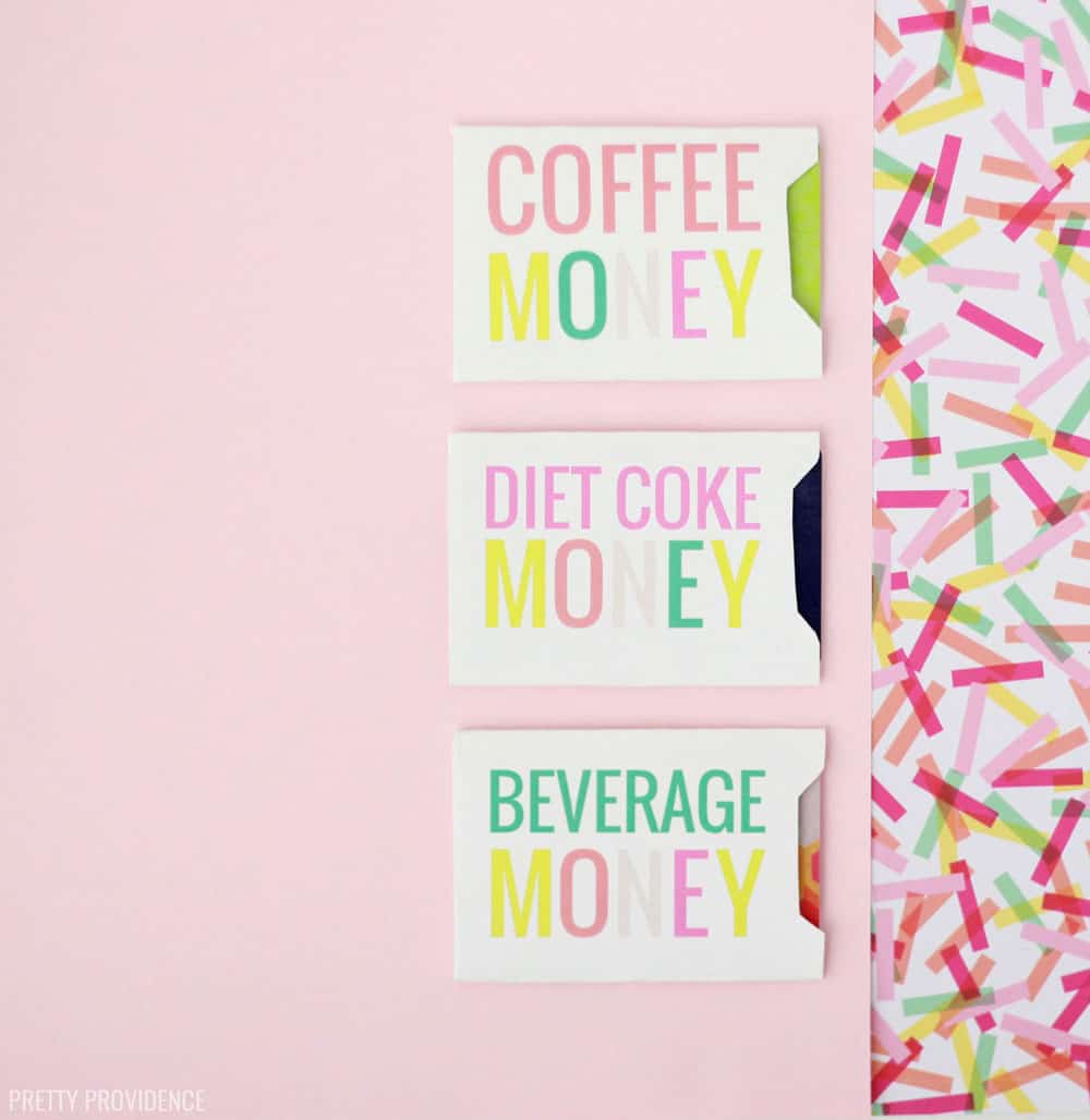 White card envelopes folded with gift cards in them, 'Coffee money' 'Diet Coke Money and 'Beverage Money' in colorful letters on a pink background with confetti.