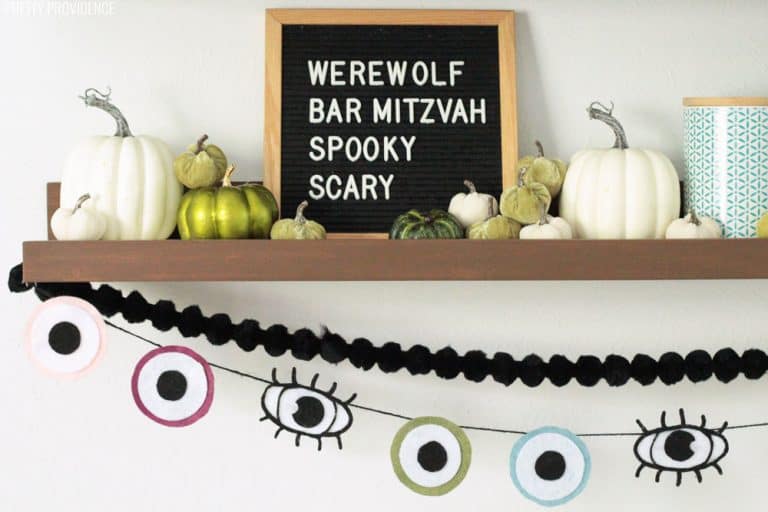 Halloween Decoration Eyeball Garland, Black Pom Pom Garland, Green and White Pumpkins on a Mantel