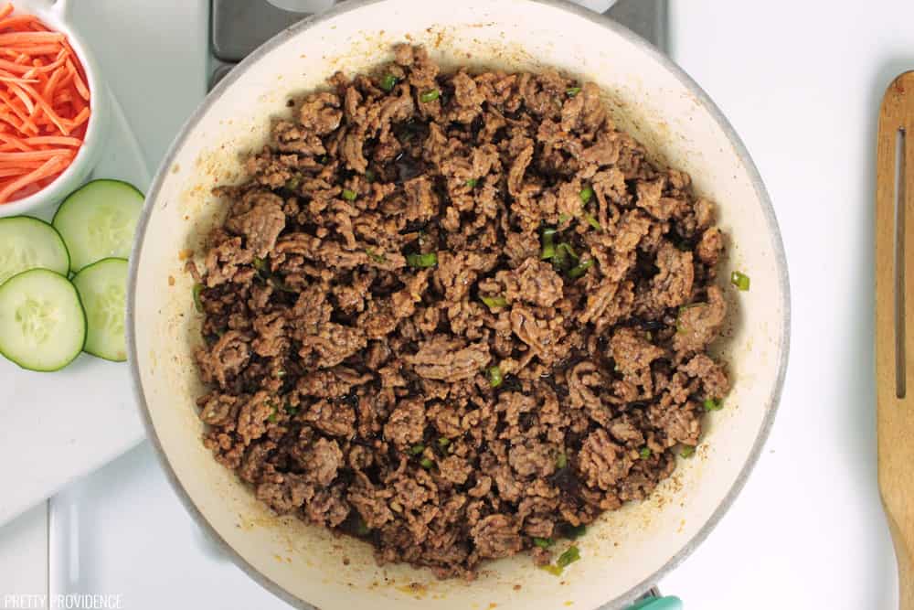 Korean ground beef, cooked and cooling in a pan.