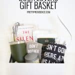 a gift basket filled with items for a reader against a white backdrop with pinterest text