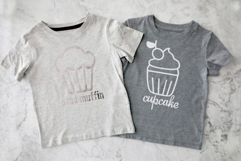 two grey t shirts next to each other, one says "stud muffin" one says "cupcake"