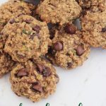 Oatmeal Zucchini breakfast cookies on a white marble surface with title text on the photo
