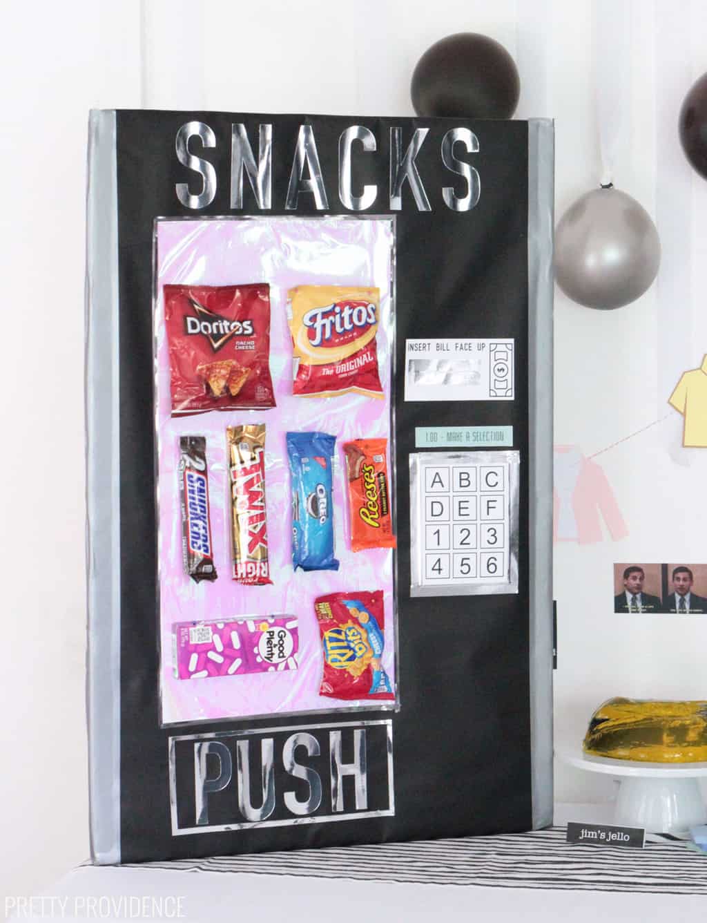 Black poster board vending machine for 'The Office' themed party