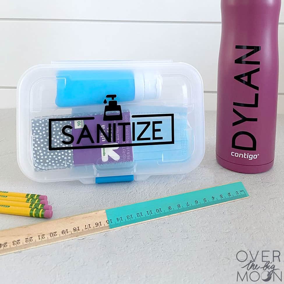 Sanitizing kit for school and water bottle with label "Dylan"