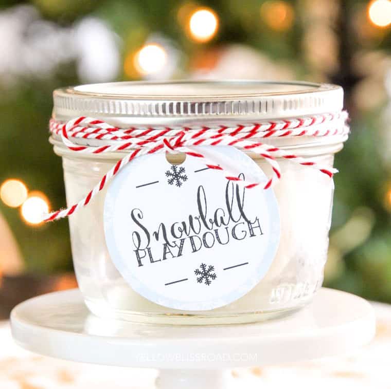 Snowball play dough in a mini mason jar with holiday gift tag