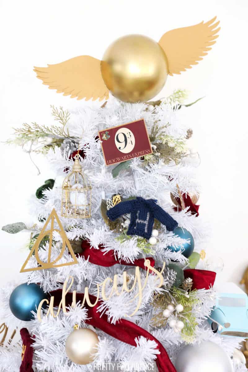 Top half of Harry Potter Christmas Tree with golden snitch topper and DIY ornaments